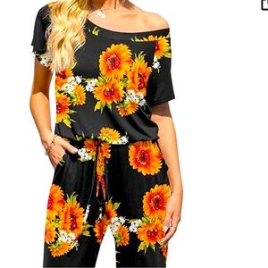 Women’s NWT floral jumpsuit with pockets Sz X-Large